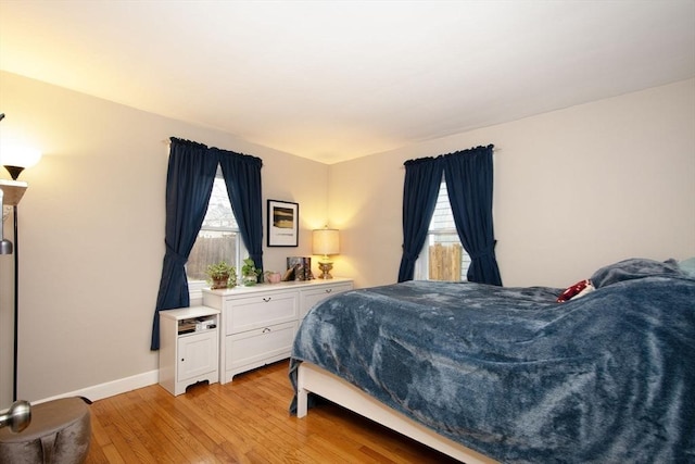 bedroom featuring light wood-type flooring