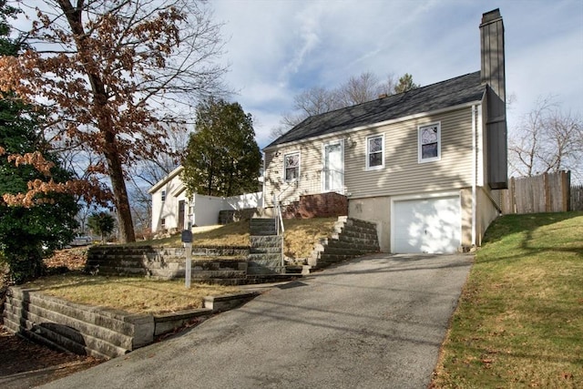 view of front of house with a garage