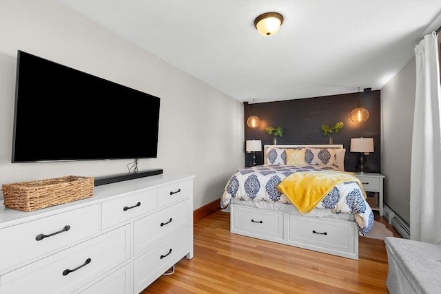 3 Scotland Heights Rd, Haverhill, MA 01832 - bedroom with an accent wall, a baseboard radiator, light wood-style floors, and baseboards