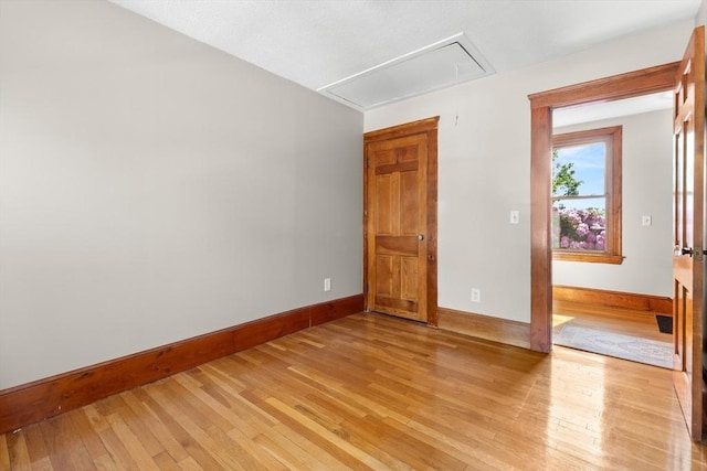 3 Scotland Heights Rd, Haverhill, MA 01832 - unfurnished room featuring attic access, light wood-style flooring, and baseboards