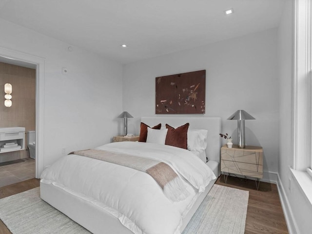 559 E Broadway Unit 559, Boston, MA 02127 - bedroom featuring wood finished floors and baseboards