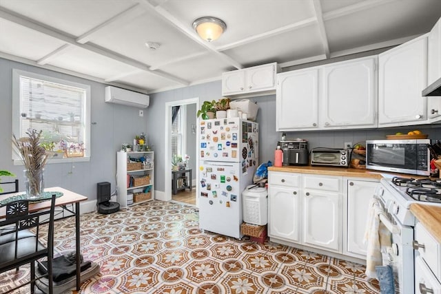 109 Eutaw St, Boston, MA 02128 - kitchen featuring a wall mounted air conditioner, coffered ceiling, a toaster, white cabinetry, and white appliances