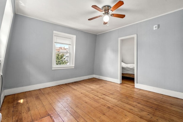 109 Eutaw St, Boston, MA 02128 - unfurnished room featuring a ceiling fan, ornamental molding, wood-type flooring, and baseboards
