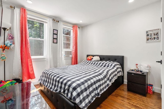 109 Eutaw St, Boston, MA 02128 - bedroom with wood finished floors, baseboards, and recessed lighting
