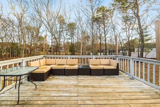 wooden deck featuring an outdoor hangout area