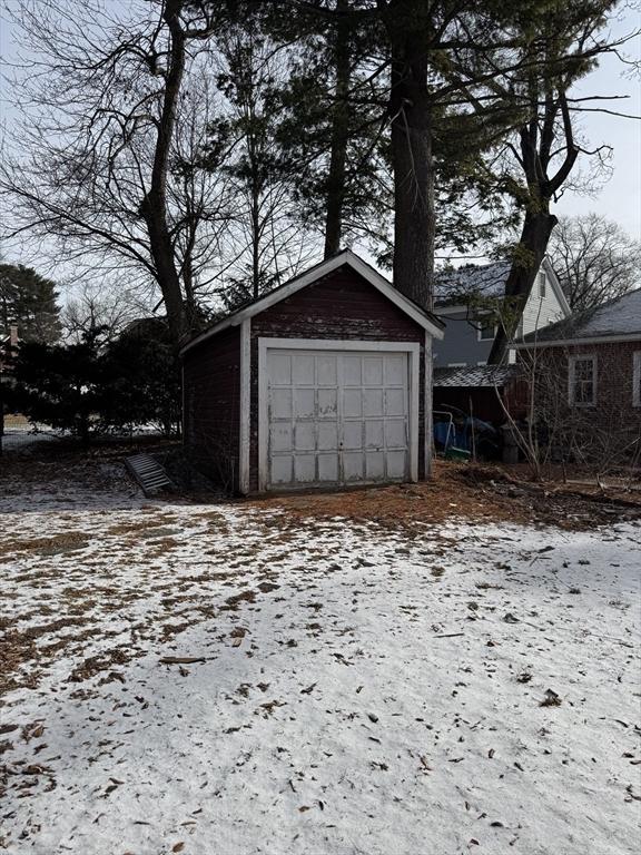 view of snow covered garage