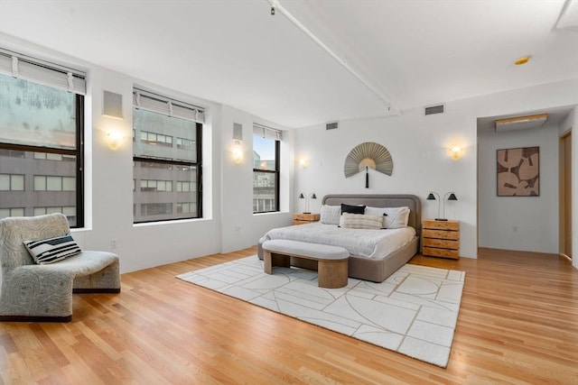453 Washington St Unit 11E, Boston, MA 02111 - bedroom with wood finished floors