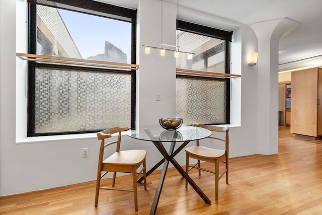453 Washington St Unit 11E, Boston, MA 02111 - dining space with wood finished floors