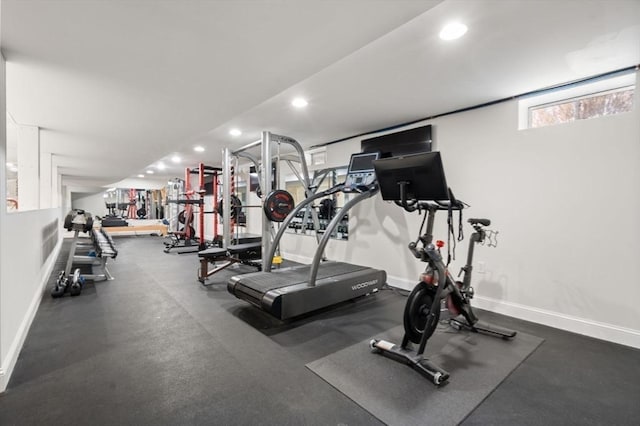 gym with recessed lighting and baseboards