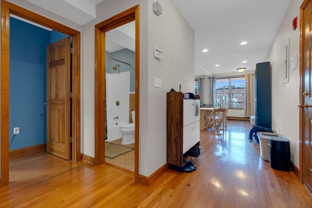 hallway featuring light wood-type flooring