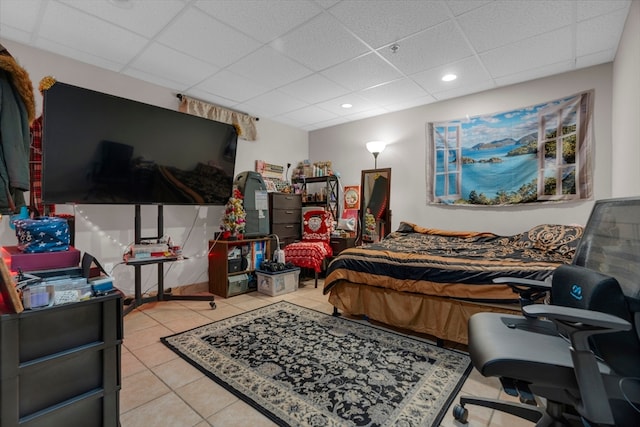 tiled bedroom with a drop ceiling