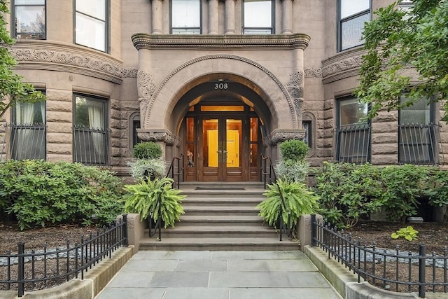 entrance to property featuring french doors