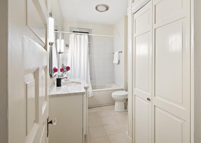 full bathroom with shower / tub combo, vanity, toilet, and tile patterned floors