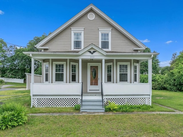 259 Main St, Blackstone, MA 01504 - view of front of house featuring covered porch and a front yard