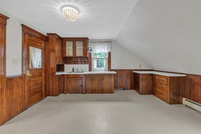 259 Main St, Blackstone, MA 01504 - kitchen with a sink, carpet floors, wainscoting, lofted ceiling, and glass insert cabinets