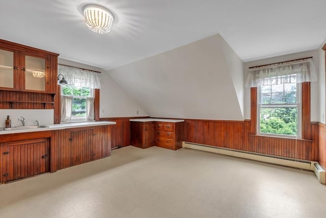 259 Main St, Blackstone, MA 01504 - additional living space featuring a sink, a baseboard heating unit, wainscoting, wood walls, and lofted ceiling