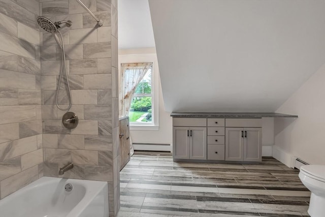 259 Main St, Blackstone, MA 01504 - full bathroom featuring baseboard heating, shower / tub combination, toilet, vanity, and lofted ceiling