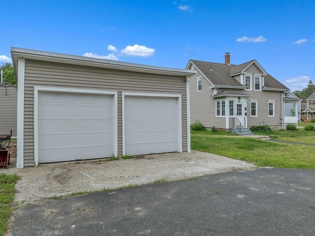 259 Main St, Blackstone, MA 01504 - view of front of house with an outbuilding, a garage, and a front yard