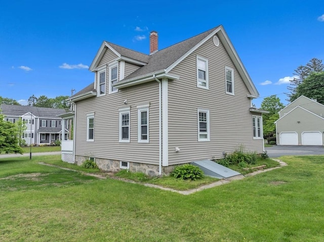 259 Main St, Blackstone, MA 01504 - view of home's exterior with a chimney, a lawn, a garage, and a shingled roof
