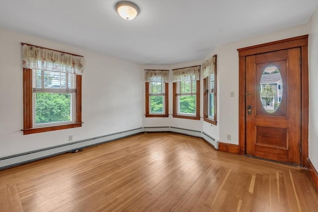 259 Main St, Blackstone, MA 01504 - entryway featuring healthy amount of natural light, light wood-type flooring, and baseboards