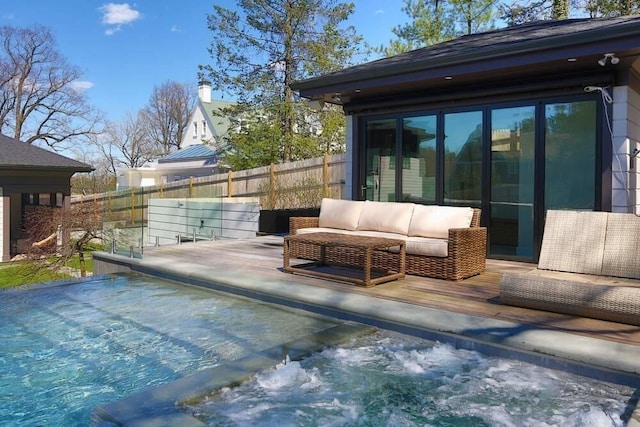 view of pool with a deck and an outdoor hangout area