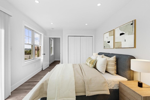 47 Parker St Unit 3, Quincy, MA 02169 - bedroom with wood finished floors, recessed lighting, and a closet