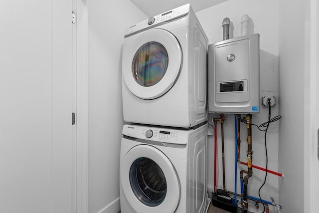 47 Parker St Unit 3, Quincy, MA 02169 - laundry area with stacked washing machine and dryer and water heater