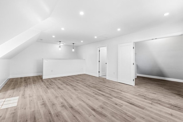 47 Parker St Unit 3, Quincy, MA 02169 - additional living space with light wood-type flooring, recessed lighting, and vaulted ceiling