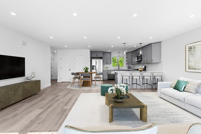 47 Parker St Unit 3, Quincy, MA 02169 - living room featuring recessed lighting and light wood-style floors