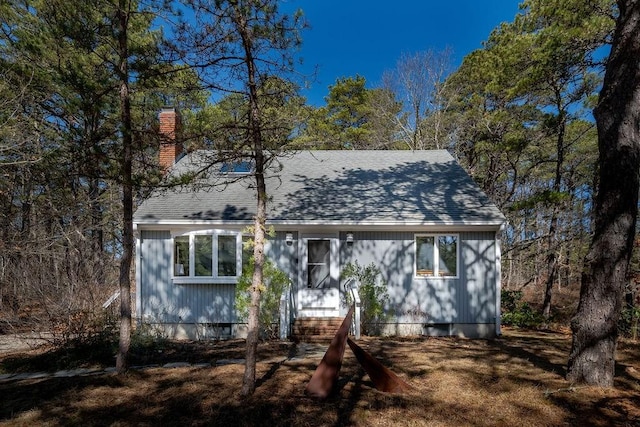 125 Governor Foss Dr, Wellfleet, MA 02667 - view of front of house with a shingled roof and a chimney