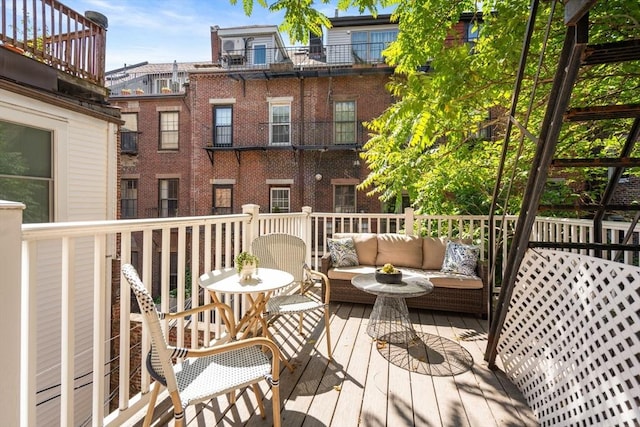 3 Melrose St Unit 3, Boston, MA 02116 - wooden deck with an outdoor hangout area