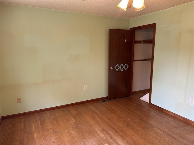 11 Glenwood St, Whitman, MA 02382 - unfurnished bedroom with wood-type flooring and a closet