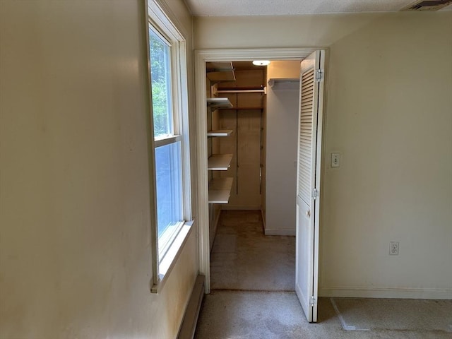11 Glenwood St, Whitman, MA 02382 - corridor featuring light colored carpet and baseboards