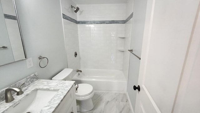 full bathroom featuring marble finish floor, toilet, vanity, and washtub / shower combination