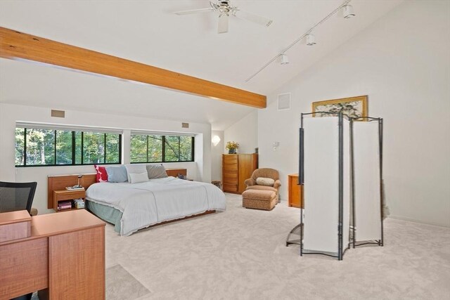 bathroom with a skylight, wooden walls, a tub to relax in, hardwood / wood-style floors, and decorative backsplash