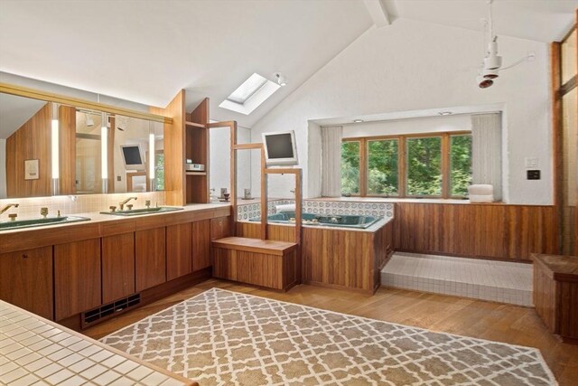 dining area featuring vaulted ceiling