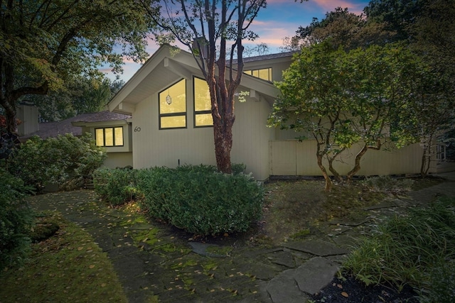 view of property exterior at dusk