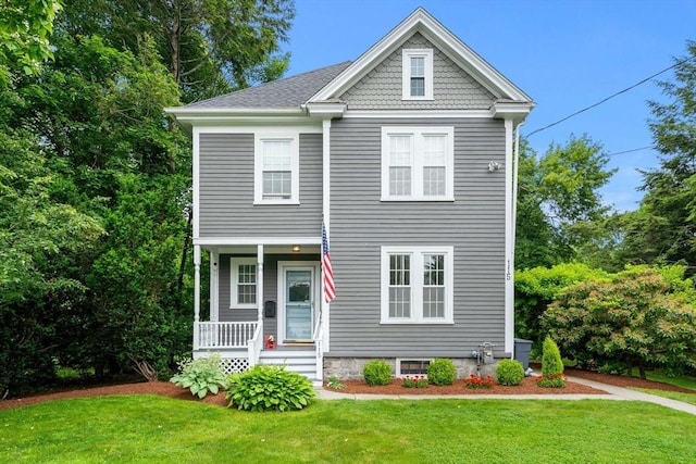 115 Elm St, Andover, MA 01810 - view of front of house with covered porch and a front yard
