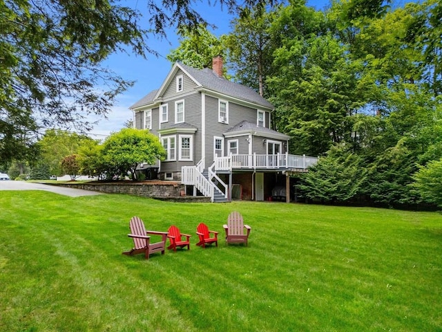 115 Elm St, Andover, MA 01810 - back of property with a chimney, stairway, a deck, a yard, and a shingled roof