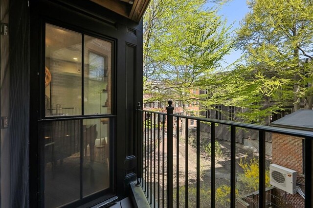 balcony featuring ac unit