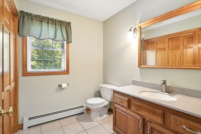 315 Woodland Way, Russell, MA 01071 - half bathroom with baseboard heating, toilet, tile patterned floors, and vanity