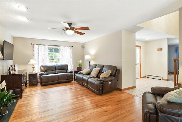 315 Woodland Way, Russell, MA 01071 - living area featuring a baseboard heating unit, a ceiling fan, light wood-style flooring, and recessed lighting