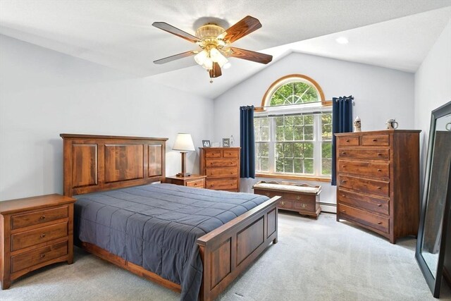 315 Woodland Way, Russell, MA 01071 - bedroom with light colored carpet, vaulted ceiling, ceiling fan, and a baseboard heating unit