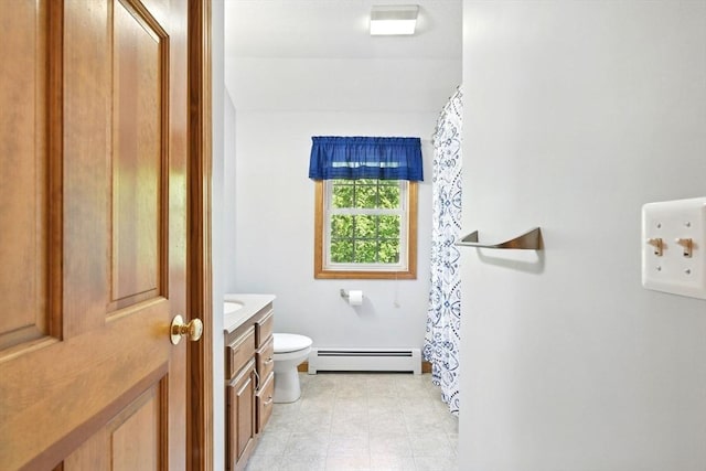315 Woodland Way, Russell, MA 01071 - full bathroom with baseboard heating, vanity, toilet, and a shower with curtain