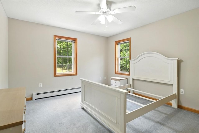 315 Woodland Way, Russell, MA 01071 - carpeted bedroom with baseboard heating, baseboards, and a ceiling fan