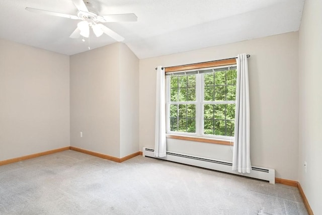 315 Woodland Way, Russell, MA 01071 - carpeted spare room featuring a baseboard heating unit, baseboards, and a ceiling fan