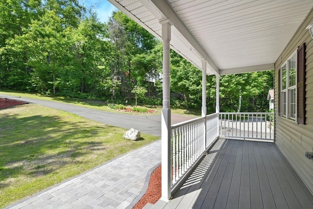 315 Woodland Way, Russell, MA 01071 - wooden porch with a yard and view of scattered trees