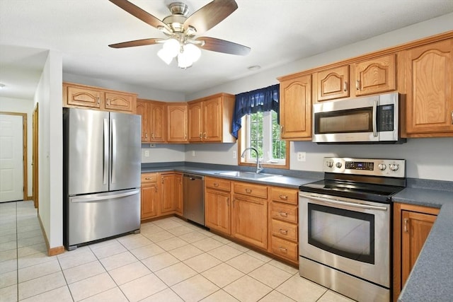 315 Woodland Way, Russell, MA 01071 - kitchen featuring appliances with stainless steel finishes, a sink, dark countertops, and ceiling fan