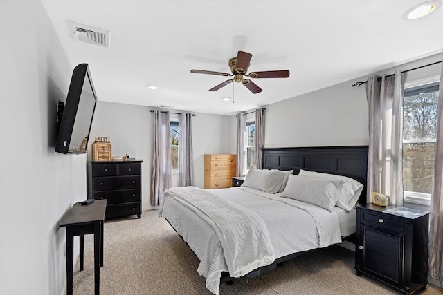 28 Manomet Beach Blvd, Plymouth, MA 02360 - bedroom featuring multiple windows, light colored carpet, recessed lighting, and a ceiling fan