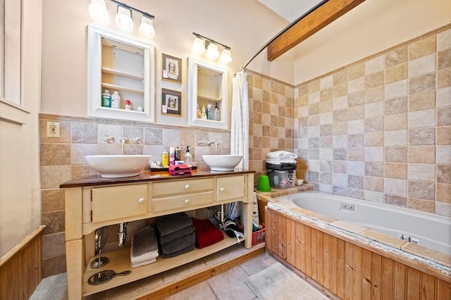 bathroom featuring vanity, tile walls, plus walk in shower, and tile patterned flooring